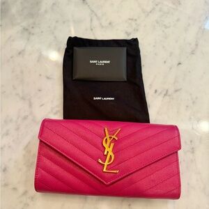 Saint Laurent Cassandre Matelasse large flap leather wallet in fuschia